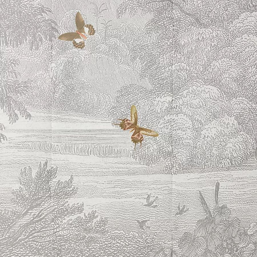 A black and white mural with gold details