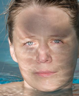 Roni Horn photograph of woman's face in swimming pool