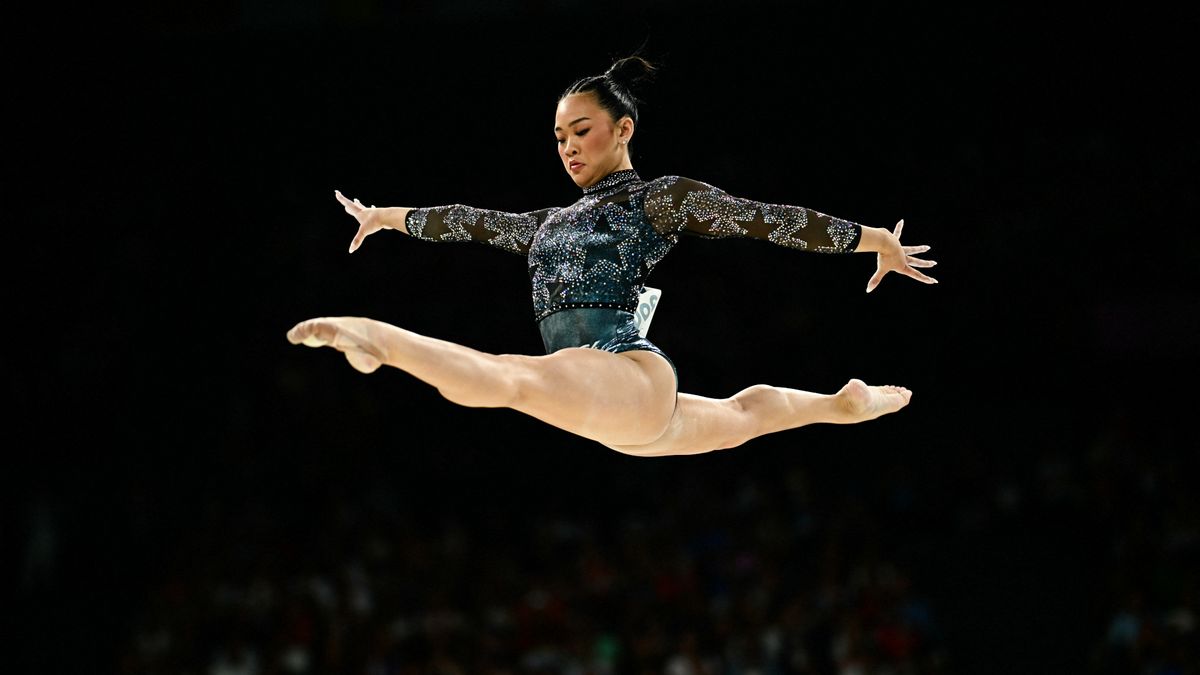 Team USA&#039;s Sunisa Lee leaps into the splits off the balance beam in a star-spangled leotard at the 2024 Paris Olympics Games.