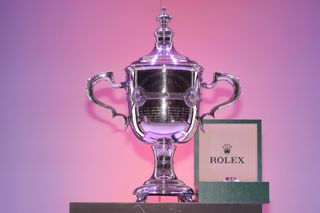 The LPGA Player of the Year trophy and a Rolex watch