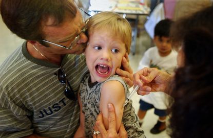 A California child gets vaccinated before starting school