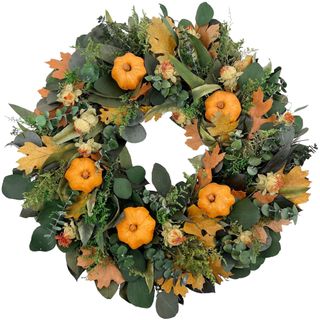 Fall wreath with faux pumpkins