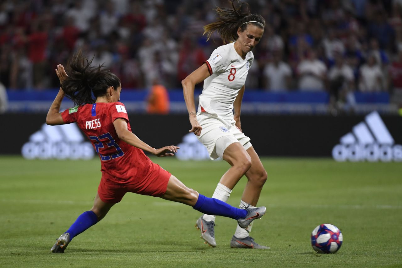 USA&amp;#039;s Christen Press and England&amp;#039;s midfielder Jill Scott during the France 2019 Women&amp;#039;s World Cup semi-final.