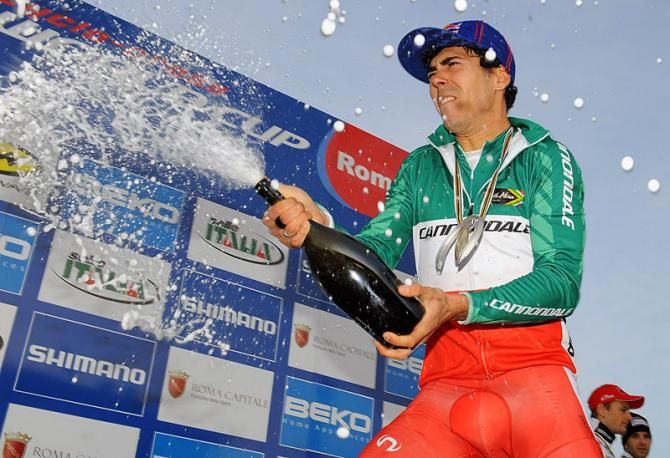 Marco Aurelio Fontana (Cannondale) lets loose with the bubbly after his third place finish in Rome.