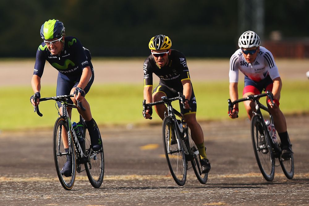 Alex Dowsett of the Movistar Team leads the breakaway group though Wattisham Airfield on stage 7.