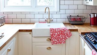 cream country kitchen with ceramic sink