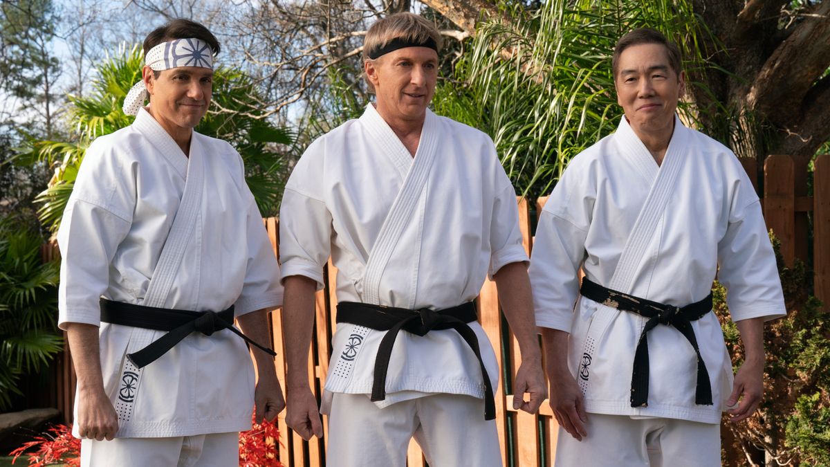 L-R: Ralph Macchio as Daniel LaRusso, William Zabka as Johnny Lawrence and Yuji Okumoto as Chozen all wearing gis side-by-side in &quot;Cobra Kai&quot; season 6