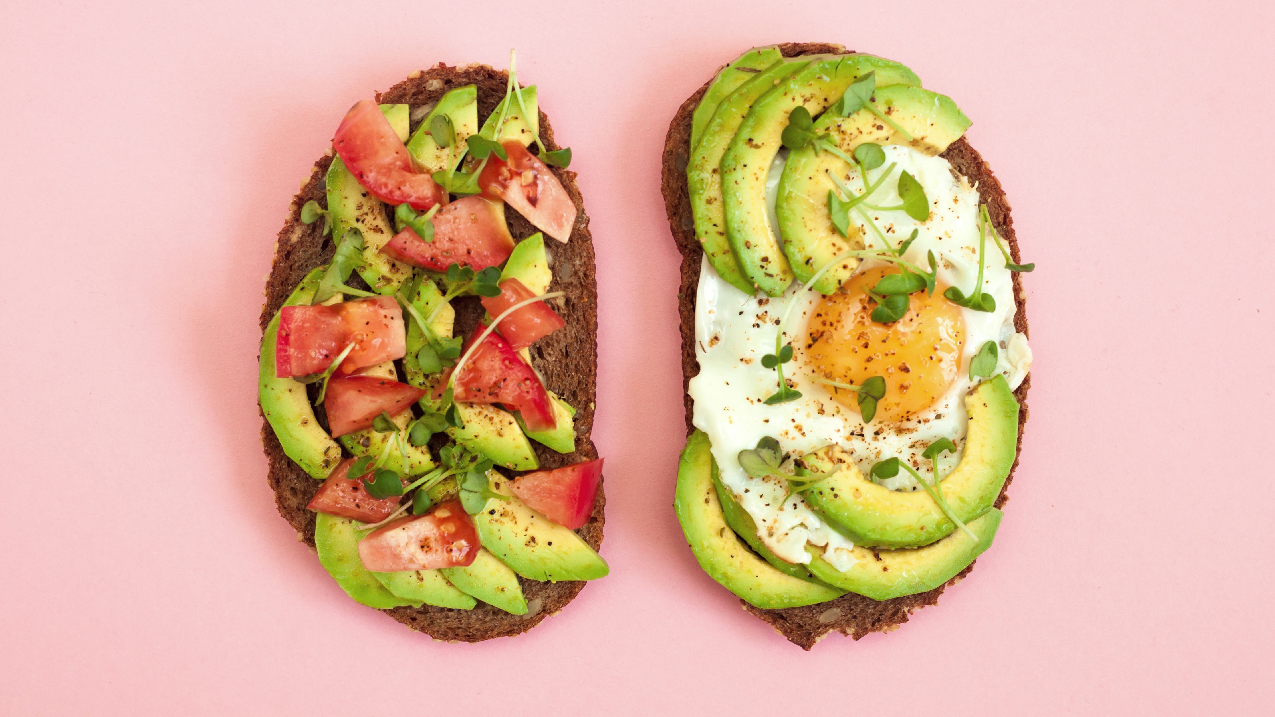 avocado on toast on pink background