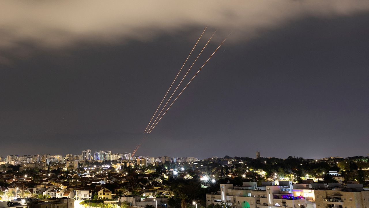 An anti-missile system operates after Iran launched drones and missiles towards Israel, as seen from Ashkelon, Israel