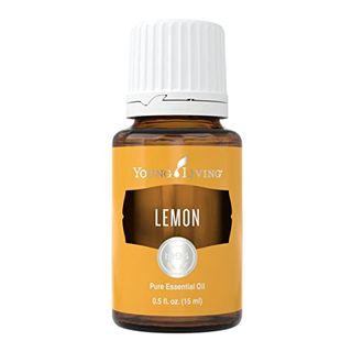 Lemon Essential Oil 15ml by Young Living Amber glass bottle with a white lid and yellow label