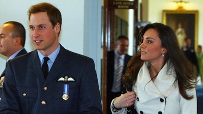 britains prince william l is pictured with his girlfriend kate middleton after his graduation ceremony at raf cranwell air base in lincolnshire, on april 11, 2008 britains prince william graduated as a royal air force raf pilot on friday after successfully completing an intensive flying coursethe prince, 25, received his wings from his father prince charles in a graduation ceremony at the raf cranwell air base in lincolnshire, east central england afp photopaul ellispool photo credit should read paul ellisafp via getty images