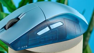 A Glacier Blue Corsair M75 wireless gaming mouse for Mac