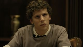 Jesse Eisenberg scowling as Mark Zuckerberg in The Social Network