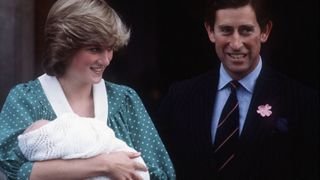 Diana and Charles coming out of the hospital with the newborn William