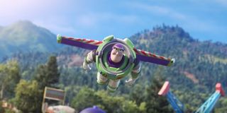 Buzz Lightyear flying high above a carnival.