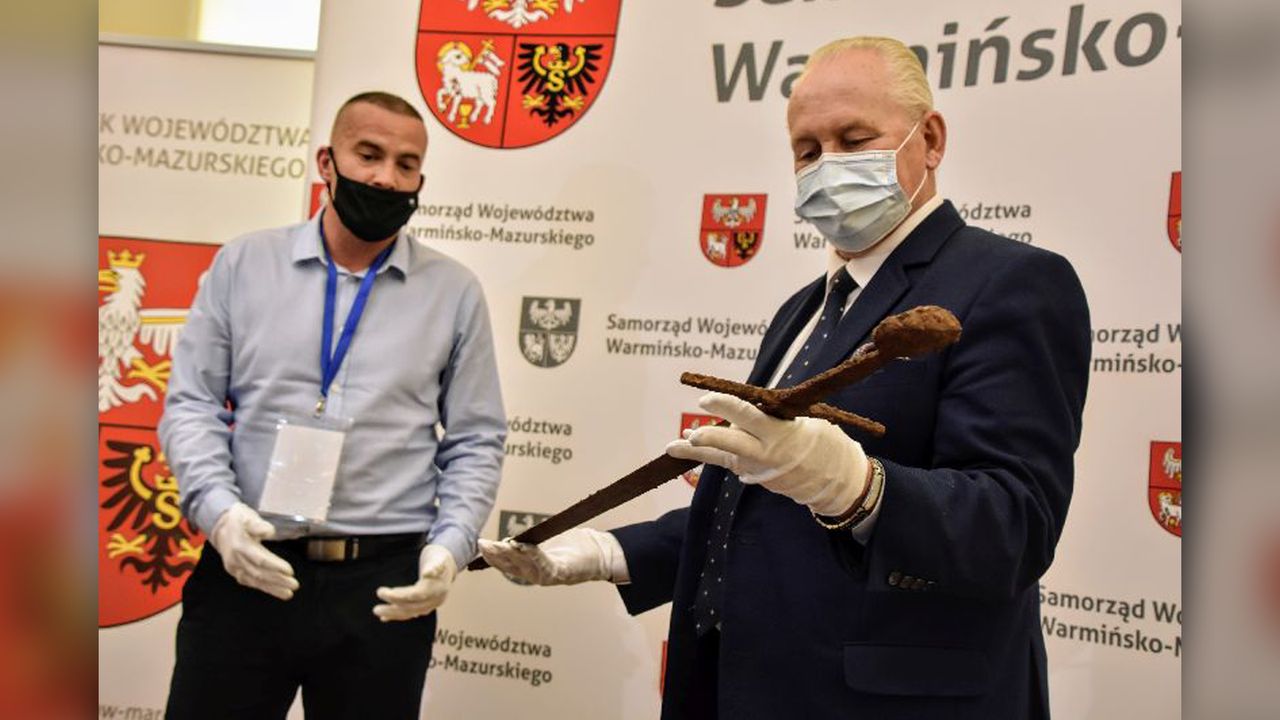 Archaeologists hope to preserve the sword and its metal accessories.