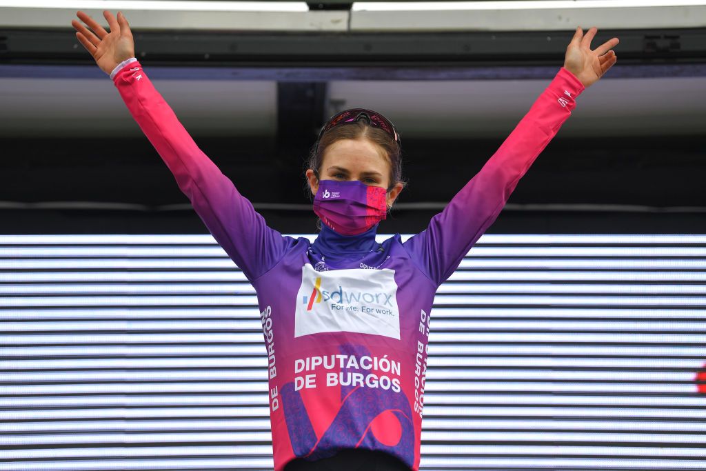 OJO GUAREA SPAIN MAY 22 Niamh FisherBlack of New Zealand and Team SD Worx Elise Purple Leader Jersey celebrates at podium during the 6th Vuelta A Burgos Feminas 2021 Stage 3 a 1154km stage from Medina de Pomar to Complejo Krstico de Ojo Guarea 768m VueltaBurgos BurgosFem UCIWWT on May 22 2021 in Ojo Guarea Spain Photo by Luc ClaessenGetty Images