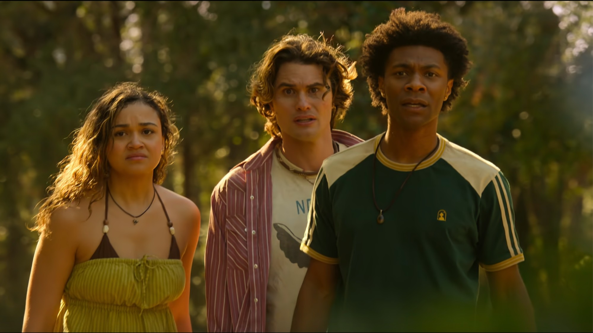 From left to right: Kiara, John B and Pope all looking concerned in Outer Banks. 