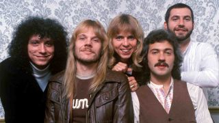 Styx posing for a photograph in 1983
