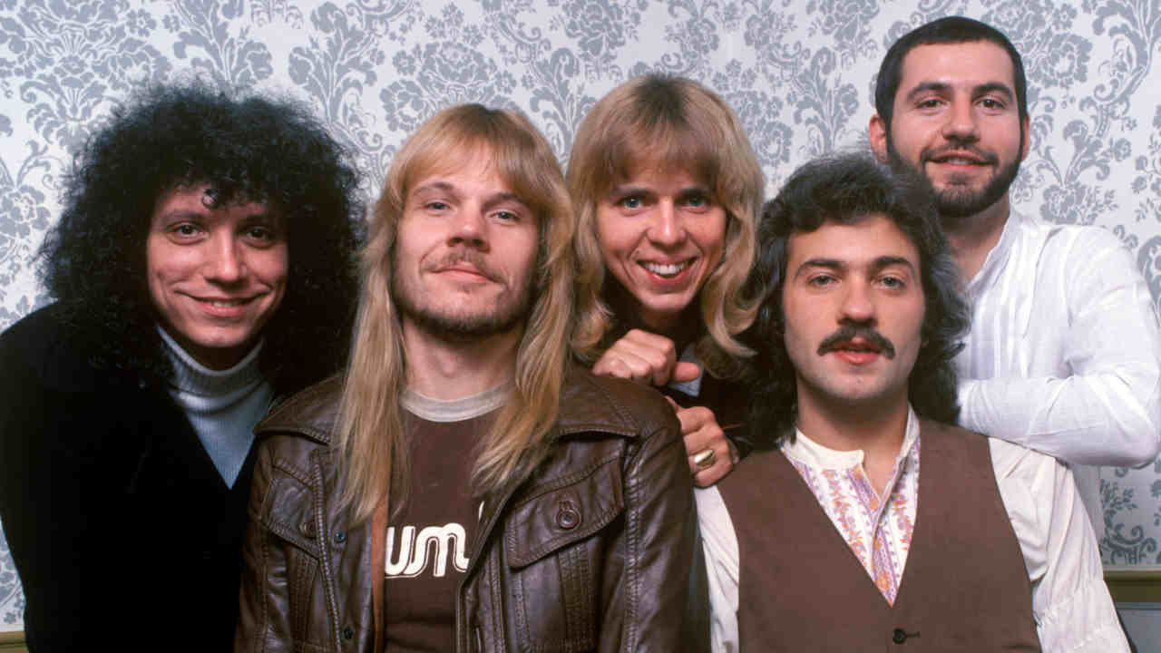 Styx posing for a photograph in 1983