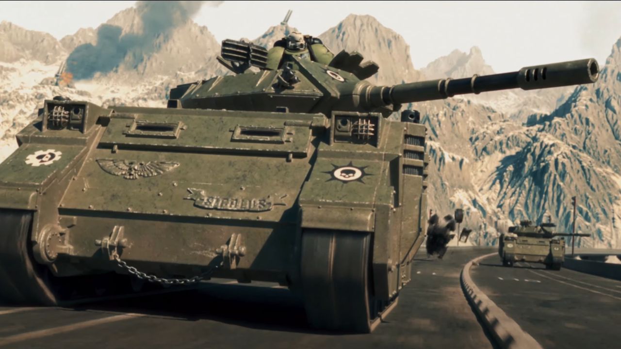 Screenshot from Astartes 2 trailer showing a pair of Predator tanks driving down a highway.