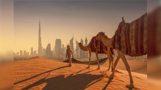 An Arab man leading camels on a sand dune in the desert with Dubai skyline in the background