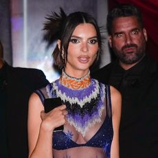 Emily Ratajkowski wearing sheer Alexander McQueen for Givenchy Spring/Summer 1998 dress to the Met Gala afterparty May 2024