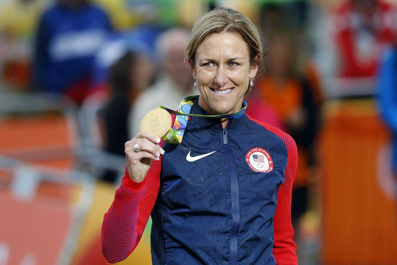 Kristin Armstrong with her third Olympic gold medal
