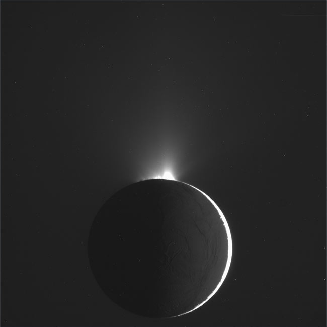 This raw, unprocessed image of Enceladus was taken by NASA&#039;s Cassini probe on Nov. 2, 2009. Bright plumes of water vapor are visible on the moon&#039;s south pole.