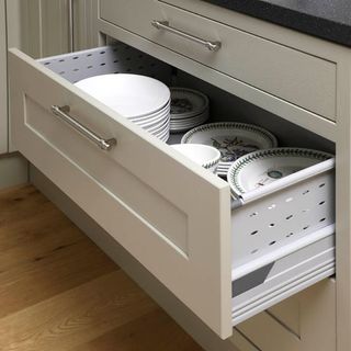 kitchen with crockery and plate drawer
