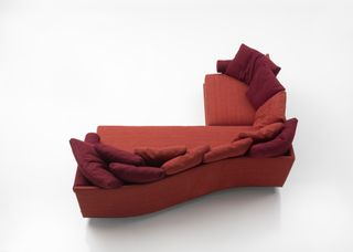 Aerial view of a red sectional sofa by B&B Italia