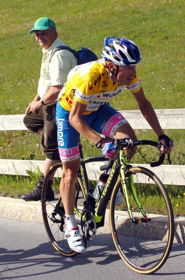 Cunego gets out of the saddle to fight the 12% climb