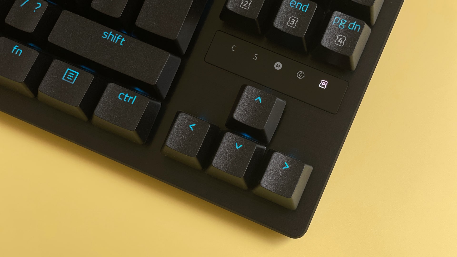 The Razer Huntsman V3 Pro Tenkeyless mechanical gaming keyboard against a yellow background.