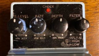 Closeup of settings on a Boss CE-5 Chorus Ensemble pedal