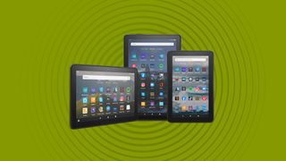 Amazon Fire tablets on a green background