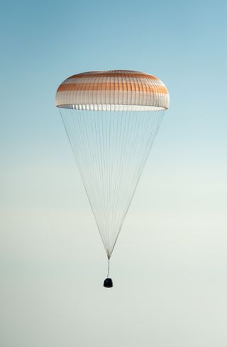 Soyuz Descends with Expedition 36 Crew