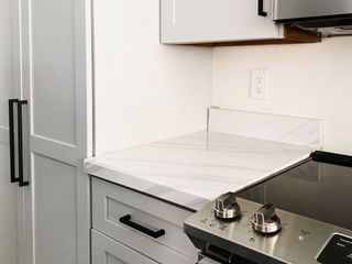 Kitchen countertop covered in contact paper