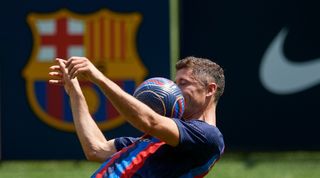 Robert Lewandowski shows off his skills in his official Barcelona presentation at Camp Nou.
