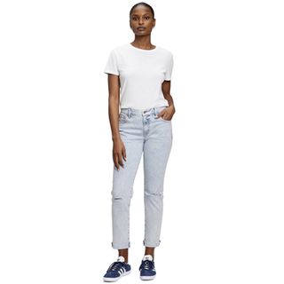 woman in light wash blue jeans