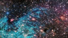 The full view of the James Webb Space Telescope's NIRCam (Near-Infrared Camera) instrument reveals a 50 light-years-wide portion of the Milky Way&rsquo;s dense center. An estimated 500,000 stars shine in this image of the Sagittarius C (Sgr C) region, along with some as-yet unidentified features.