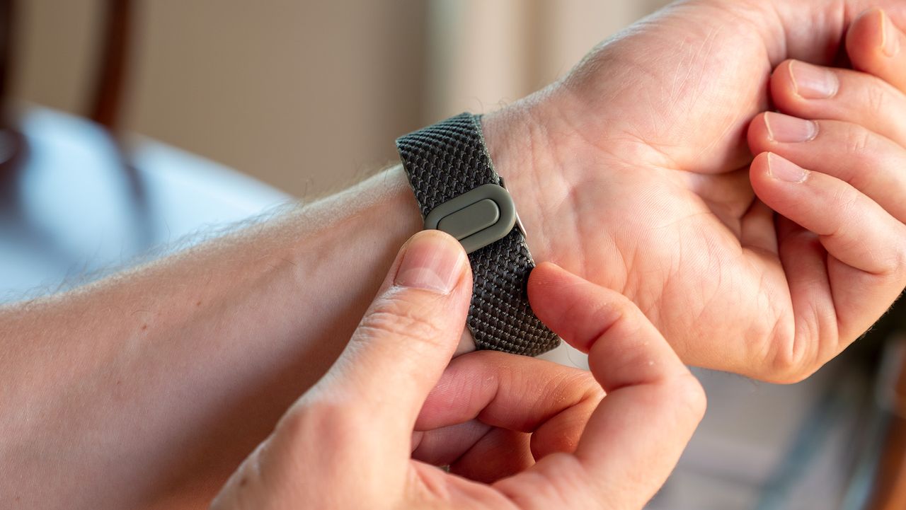 Clasping together the Ivy colorway Google Pixel Watch Woven Band