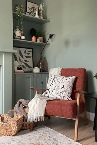 armchair in green living room