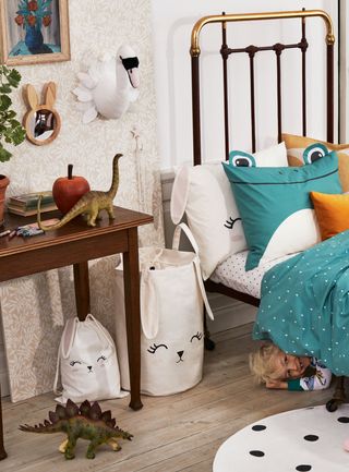 Clothes storage bags in a children's bedroom