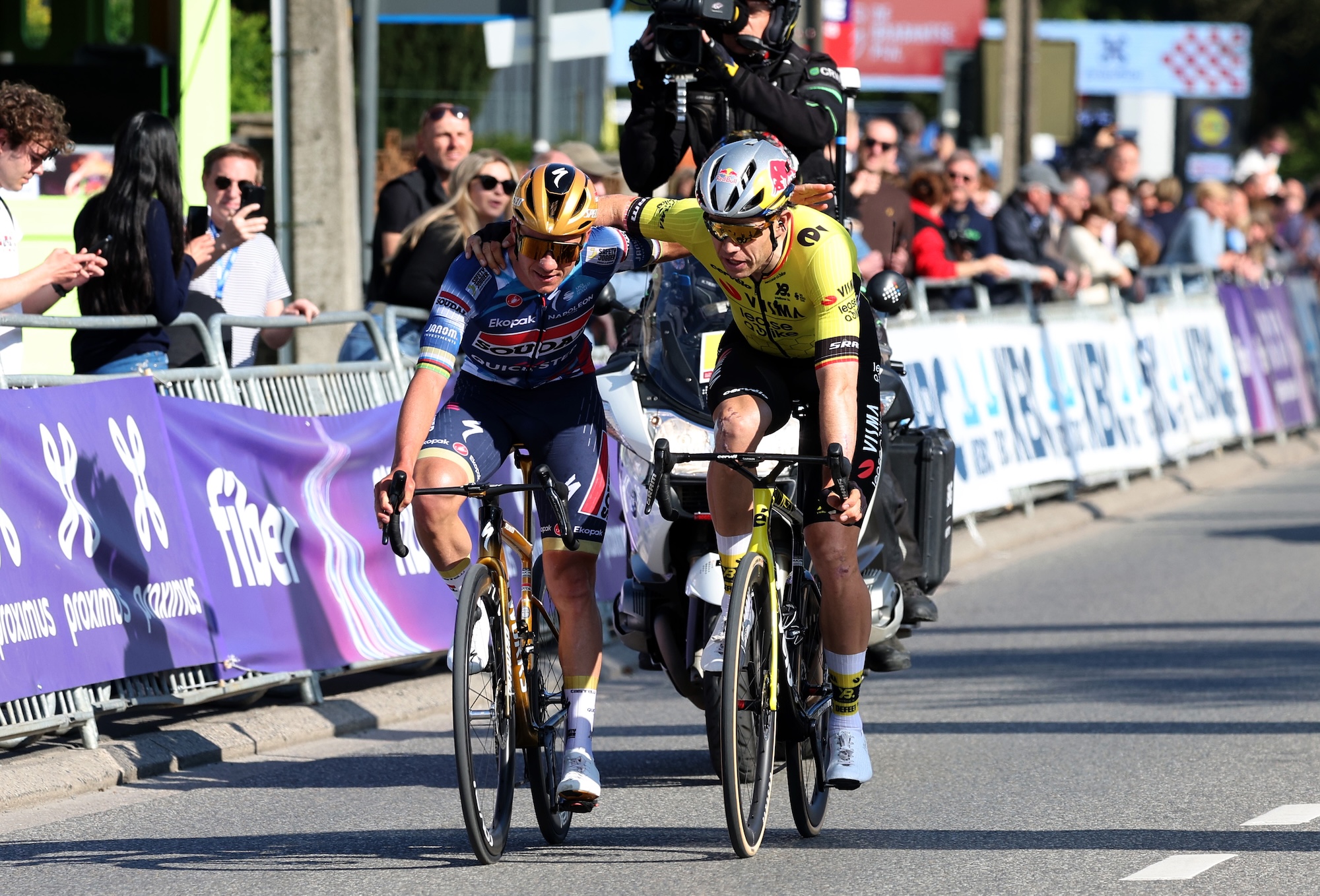 Race winner Remco Evenepoel and Wout Van Aert on second place react after the 65th De Brabantse Pijl 2026