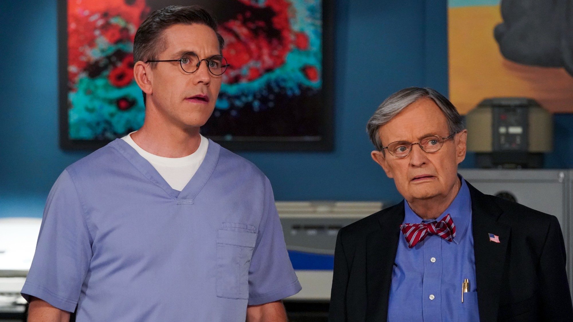 Jimmy and Ducky standing next to each other on NCIS.