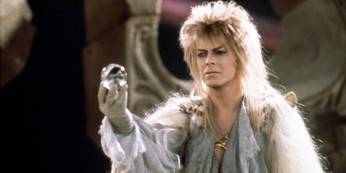 Labyrinth David Bowie ominously holds a crystal ball in his hand