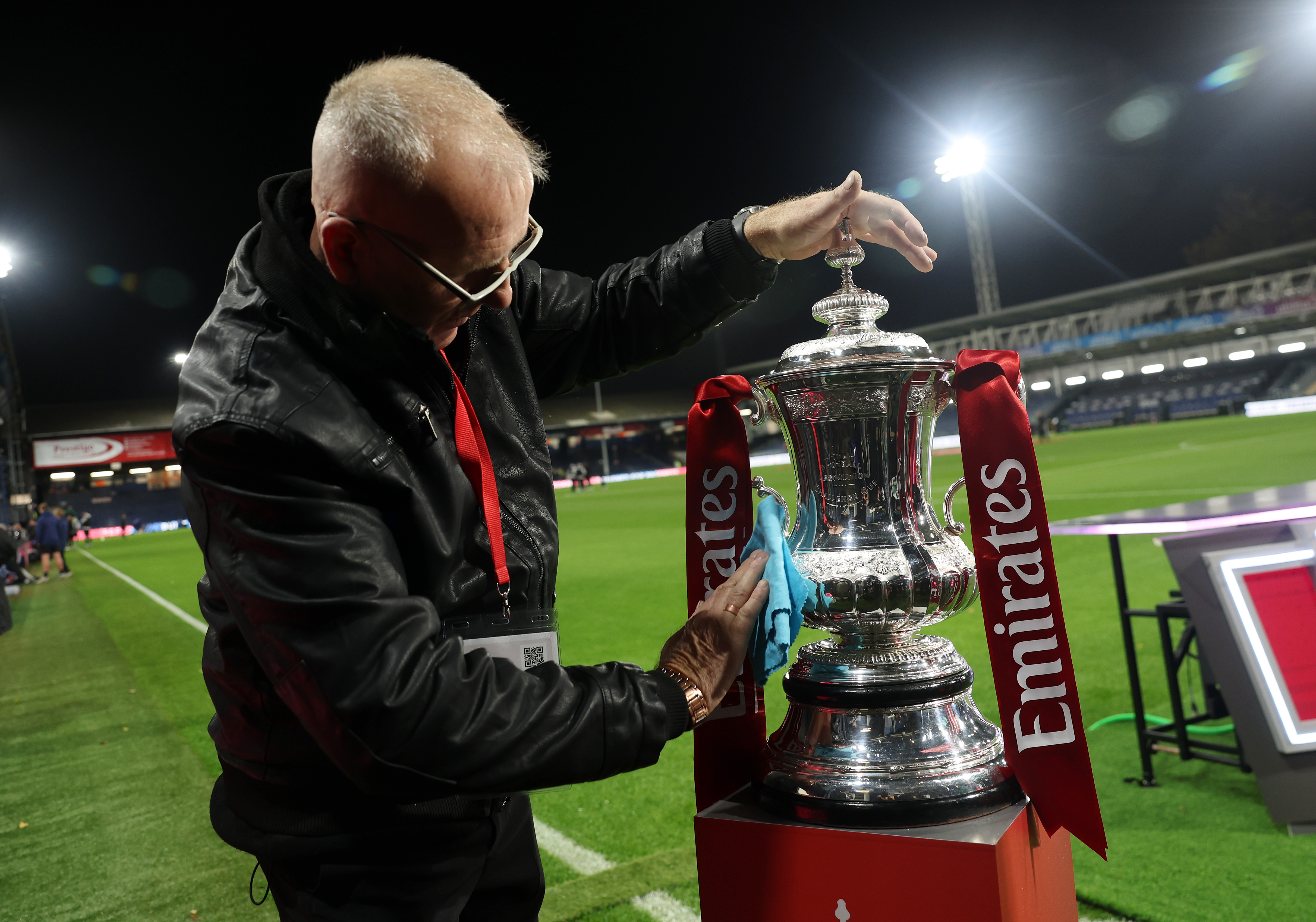 LUTON, ENGLAND - OCTOBER 31: The Emirates FA Cup trophy gets a polish before the Emirates FA Cup First Round match between Luton Town and Forest Green Rovers on October 31, 2025 in Luton, England. (Photo by Eddie Keogh/Getty Images)