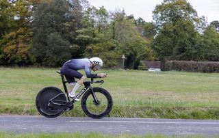 Image shows a rider holding an aero TT position