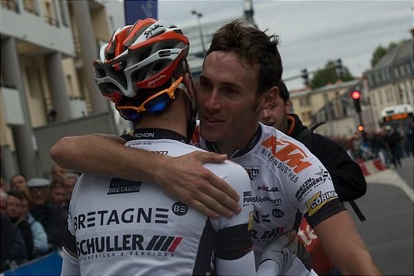 Florian Vachon (Bretagne-Schuller) celebrates his win with a teammate.