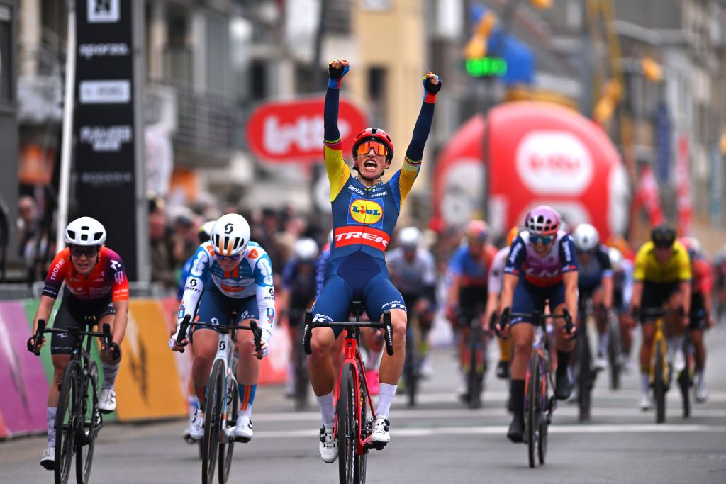 DE PANNE BELGIUM MARCH 21 Elisa Balsamo of Italy and Team Lidl Trek celebrates at finish line as race winner head of LR Daria Pikulik of Poland and Team Human Powered Health and Charlotte Kool of The Netherlands and Team dsmfirmenich PostNL during the 7th Womens Classic BruggeDe Panne 2024 a 155km one day race from Brugge to De Panne on March 21 2024 in De Panne Belgium Photo by Luc ClaessenGetty Images